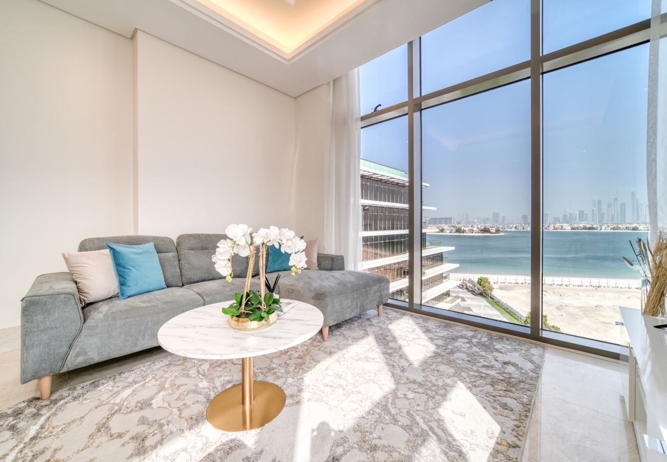 Apartment in Dubai - Chic Beachfront Living: Miami Meets The Palm