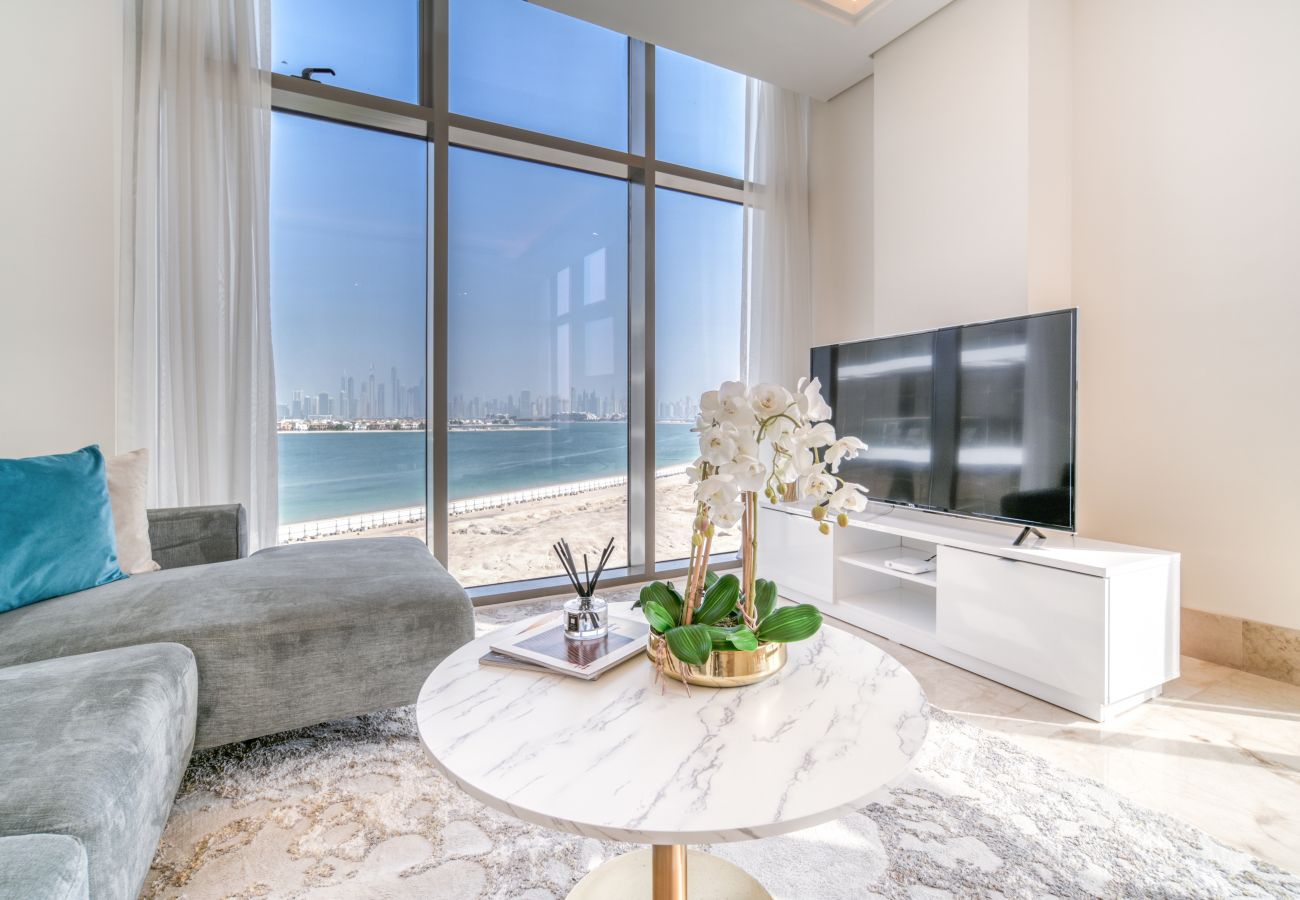 Apartment in Dubai - Chic Beachfront Living: Miami Meets The Palm