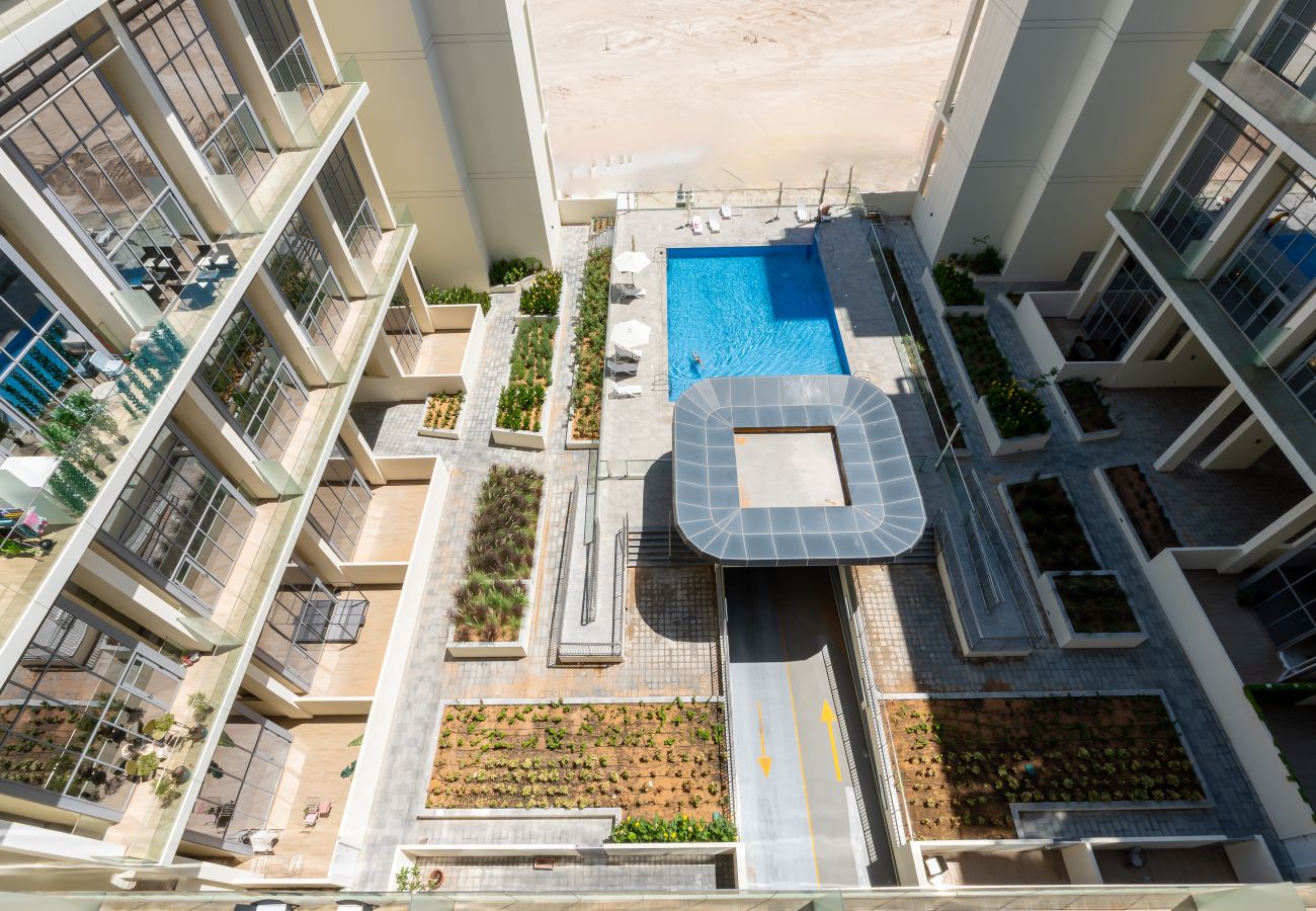 Apartment in Abu Dhabi - Prime 1BR with Pool View Balcony at Masdar City