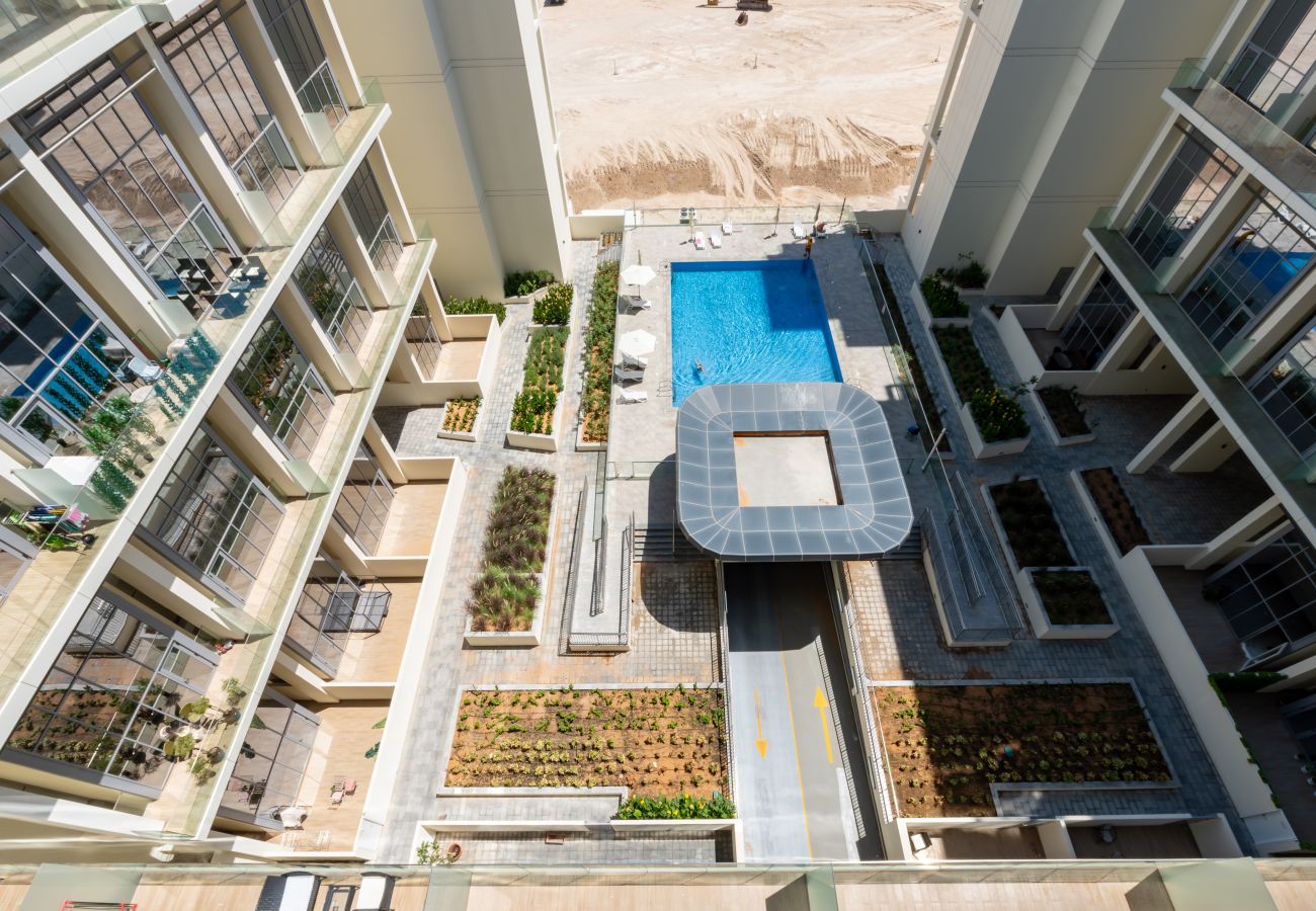 Apartment in Abu Dhabi - Prime 1BR with Pool View Balcony at Masdar City