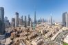 Apartment in Dubai - Sleek 3BR + Maid’s Room w/ Burj Khalifa View