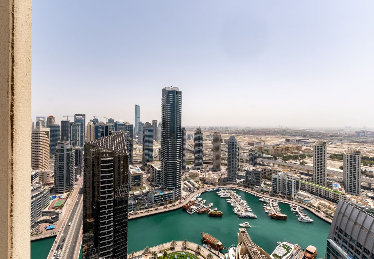 Apartment in Dubai - Trendy JBR 2BR w/ Pool and Gym, Marina Views